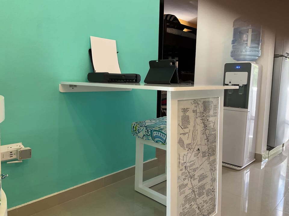 Dedicated work space featuring multiple outlets. 