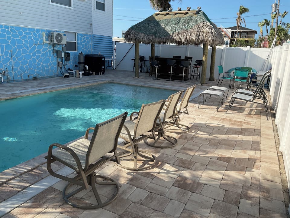 Pool with Sun Ledge and Tiki Bar
