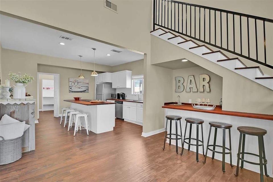Bar and kitchen area offer plenty of extra seating. Luxury finishings