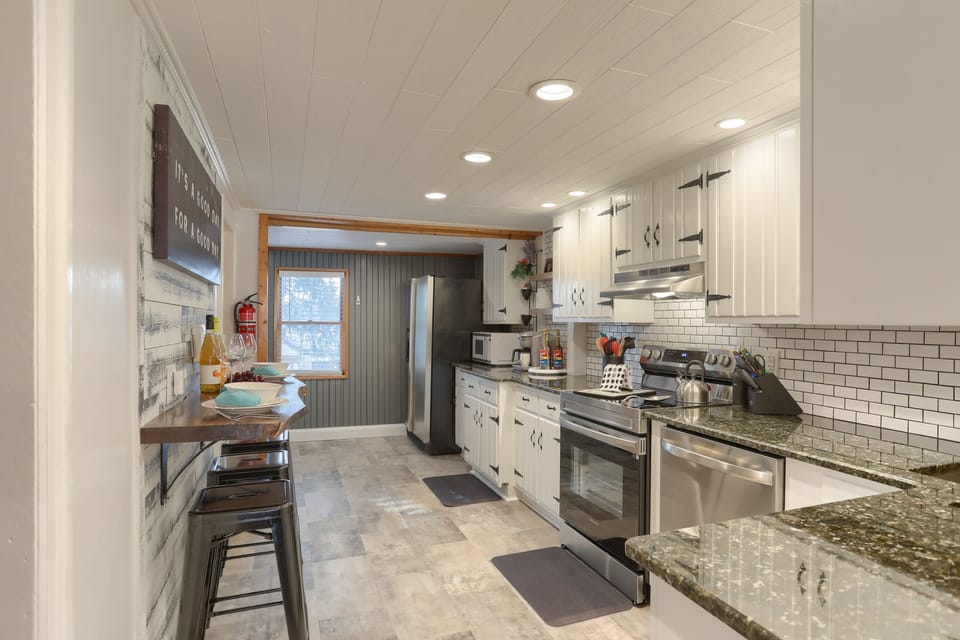 bright and cheery kitchen with all essentials you need. Room to gather too