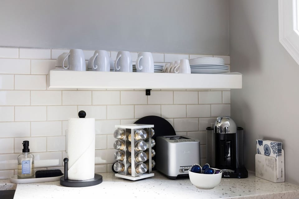 Toaster, espresso machine + espresso, coffee mugs, plates, spices & more! 