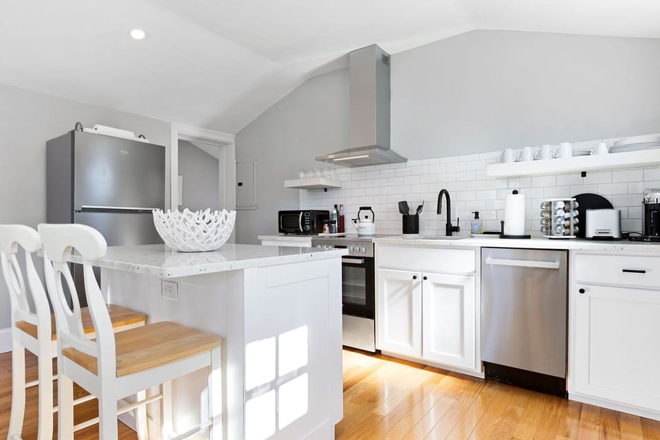 Brand new, fully stocked kitchen with stainless steel appliances. 