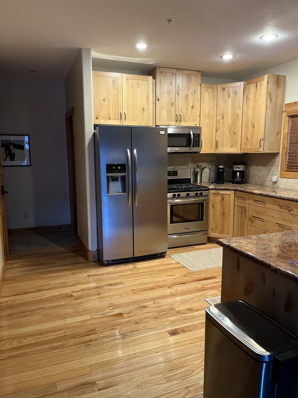 kitchen. guest room on the other side of the frig