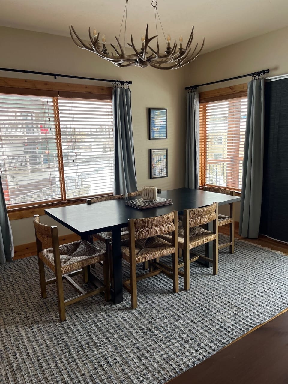 dining table that seats six. Four barstools of to the side