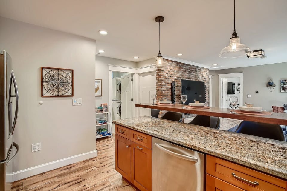 large kitchen with plenty of counter space & various cooking amenities