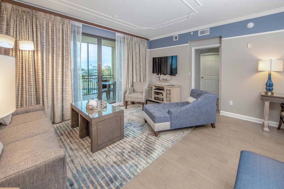 Luxuriously appointed living room with a sleeper sofa.