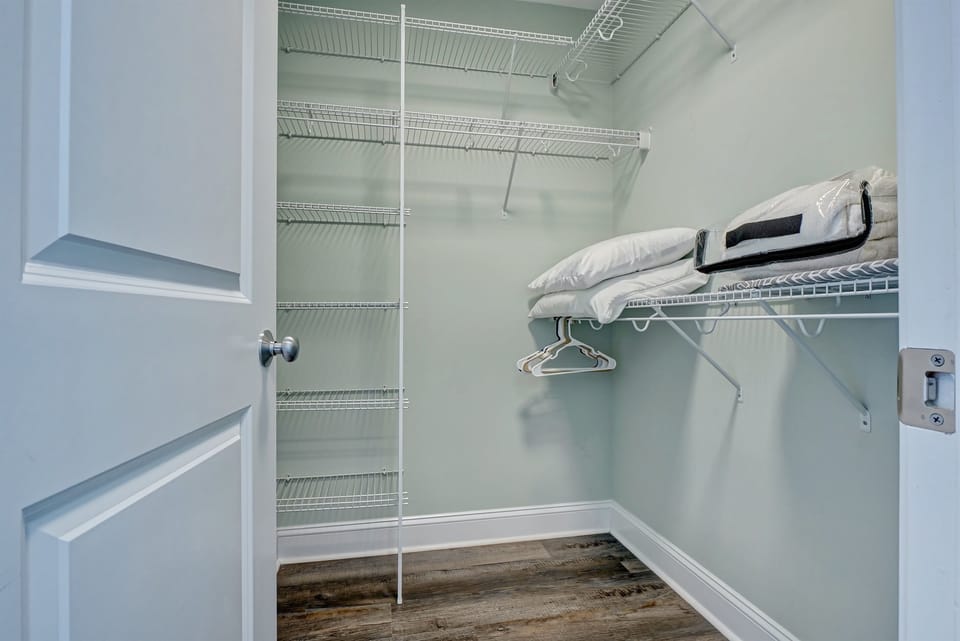 Master walk in closet, extra pillows/blankets