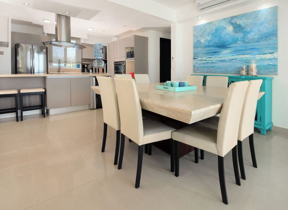 Share meals and laughter with your group to create unforgettable memories at our 8-person dining space.