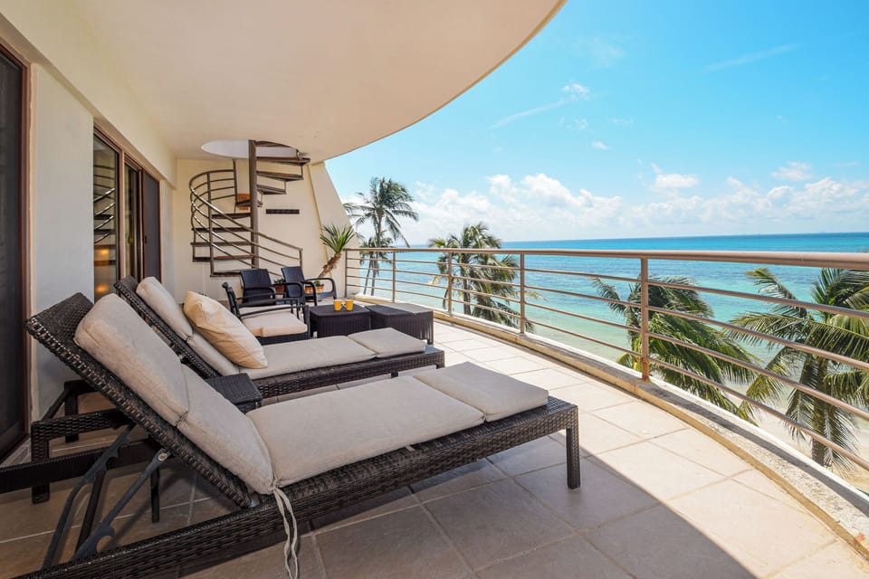 Watch crashing ocean waves from the comfort of our private terrace, featuring comfy loungers!