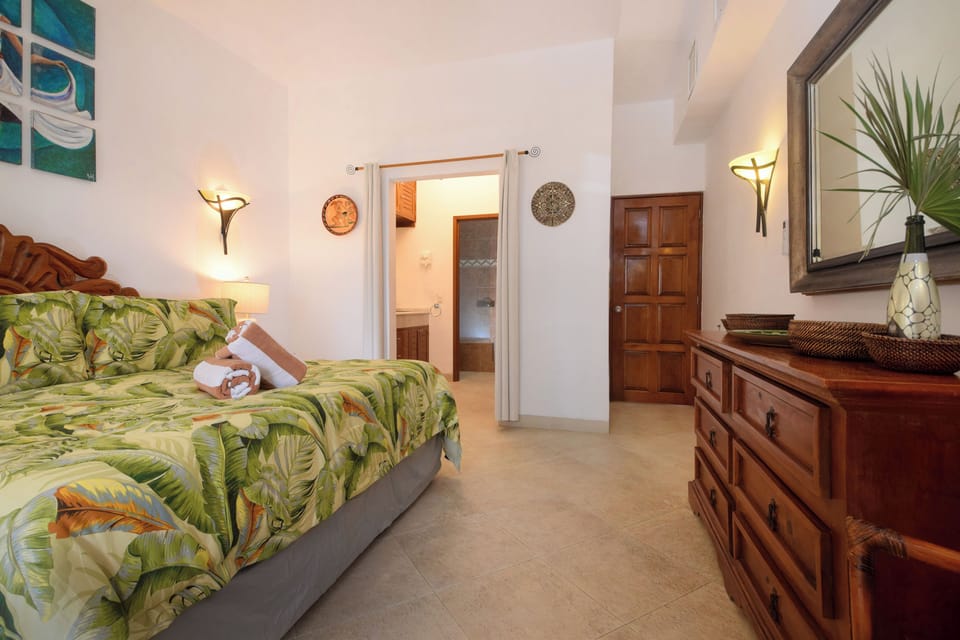Master suite with elegant decor and handcrafted Mexican furniture