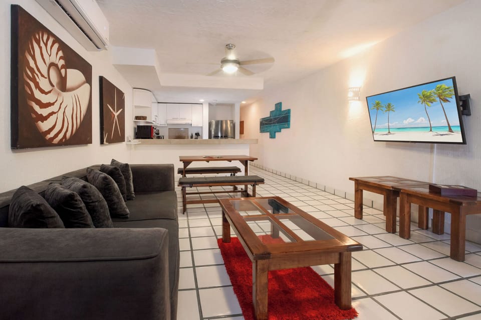 Watch your favorite shows on the flat-screen TV in this inviting space