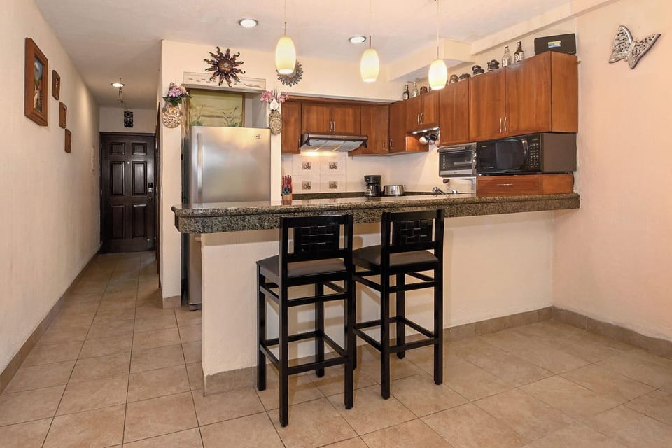 Open concept living room/dining room/kitchen