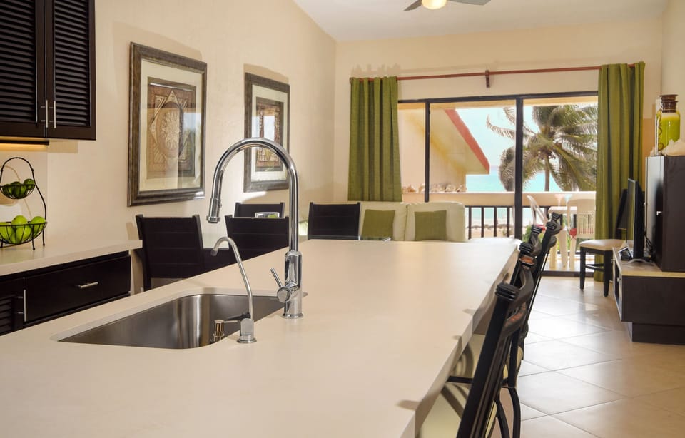 Brew your morning coffee while basking in the coastal, Playa del Carmen backdrop!