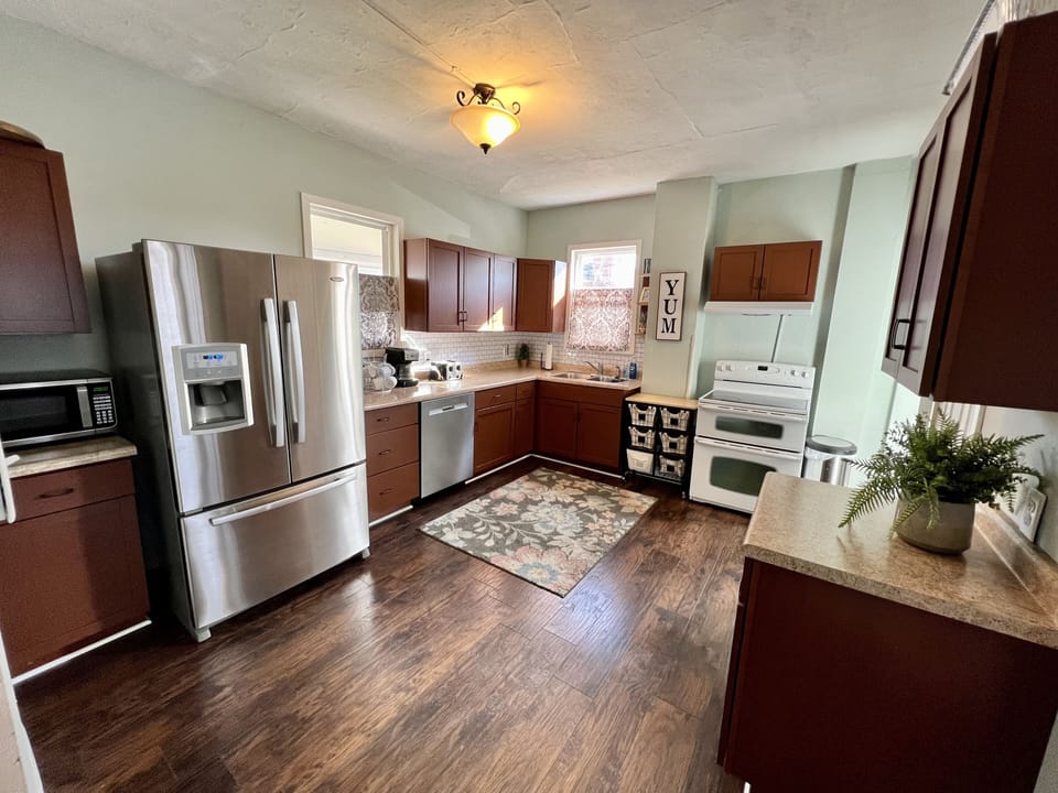 Full kitchen with stainless steel appliances and all the amenities.