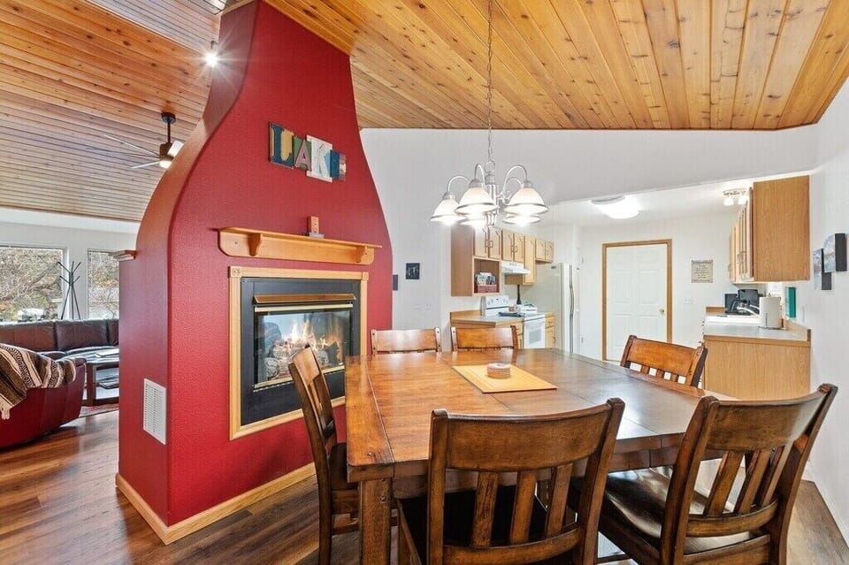 Experience meals by the fireplace, bathed in natural light and rustic charm!