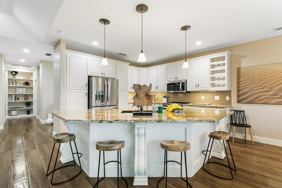 There are an abundance of close-by restaurants, but this gourmet kitchen might inspire you to culinary greatness! Nothing like custom stone countertops, stainless steel appliances, and all-new cookware to ignite your inner chef. You’ll find everything you