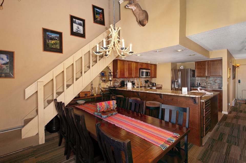 Dining room on the main level with seating for 8 people.
