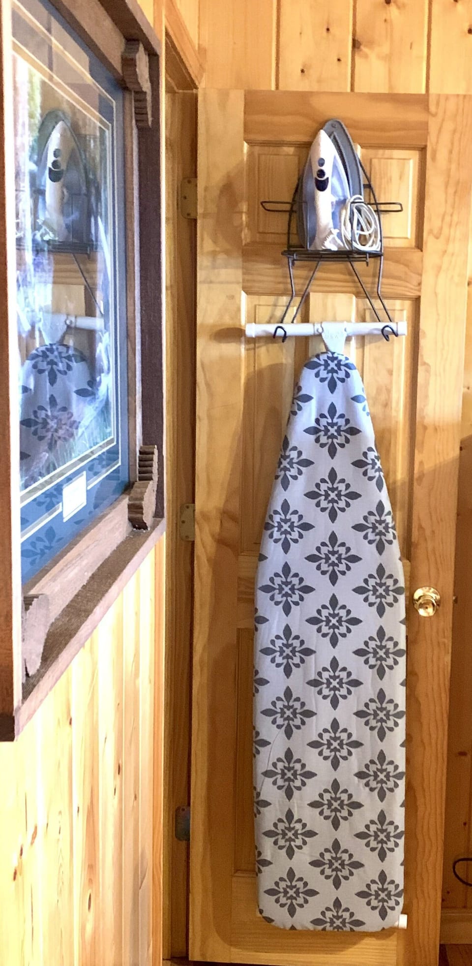 Iron and iron board in there master bedroom closet.
