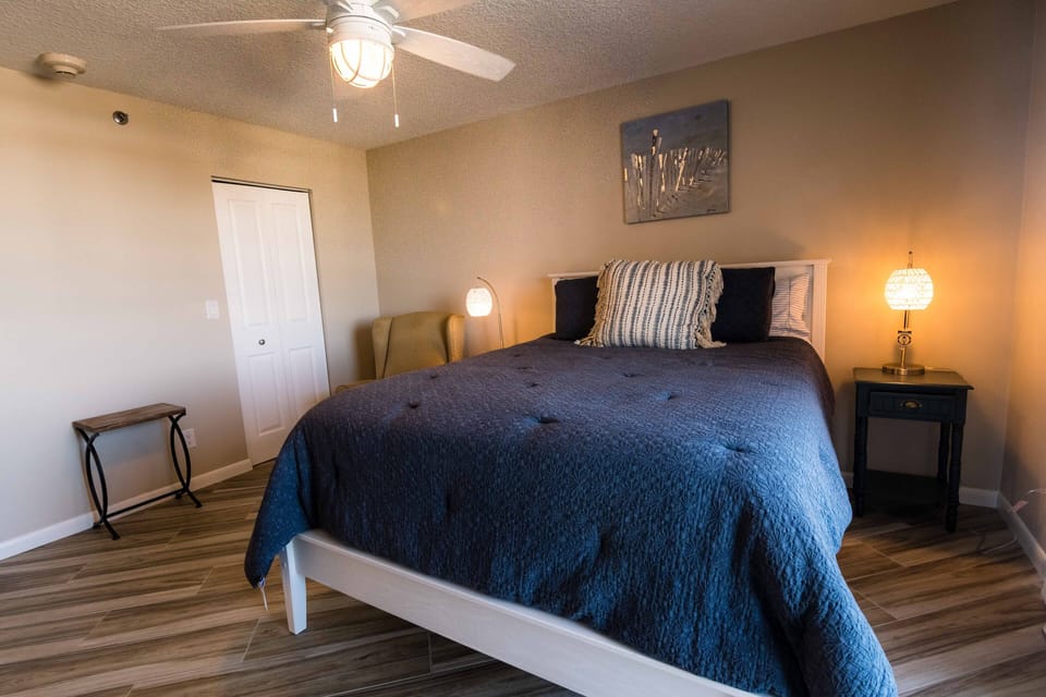 Second BR features queen bed and walk in closet