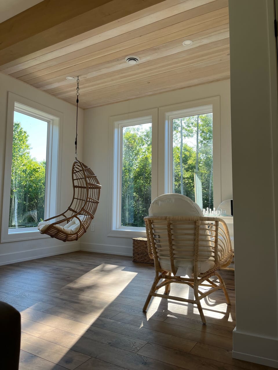 Our swinging chair for relaxing and reading in our games area