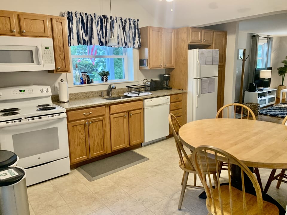 Eat in kitchen- full sized stove, fridge/freezer, dishwasher and microwave