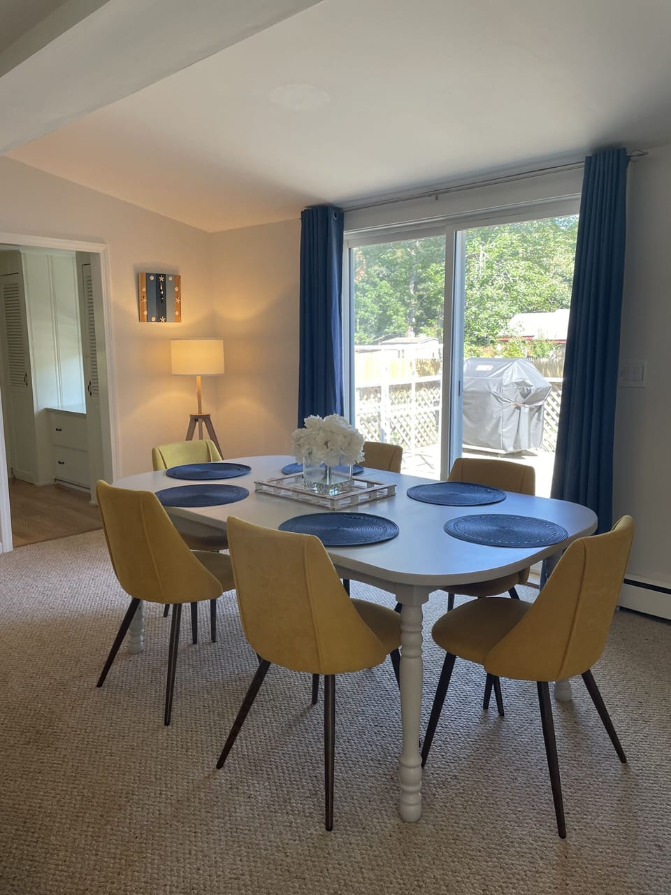 Dining area with a slider to the deck