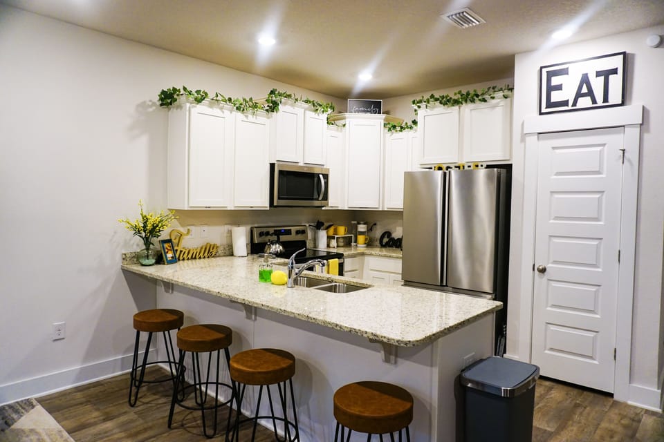 Kitchen - note refrigerator - water dispenser inside on left side