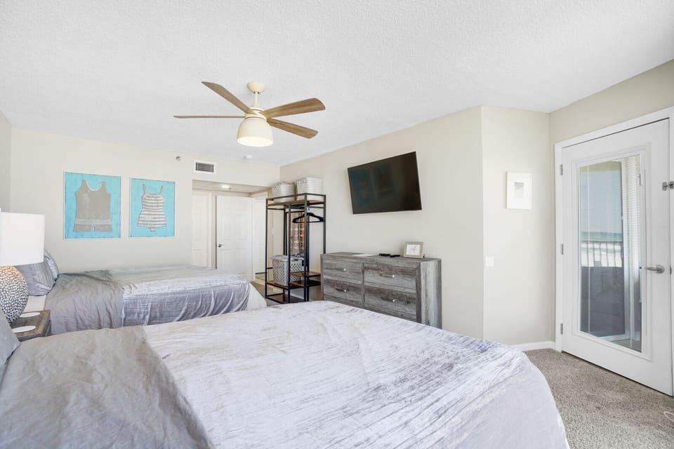 Sink into crisp linens and drift off with the gentle breeze from your ceiling fan overhead.