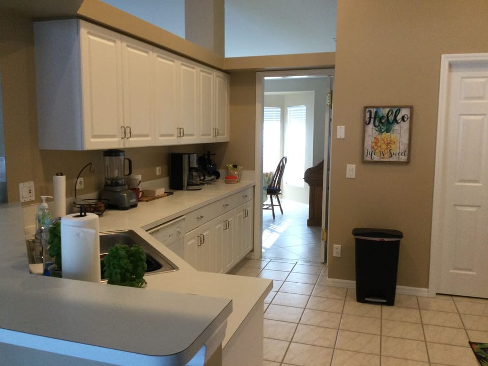 Kitchen is fully equipped and includes a dishwasher, coffee maker and blender.