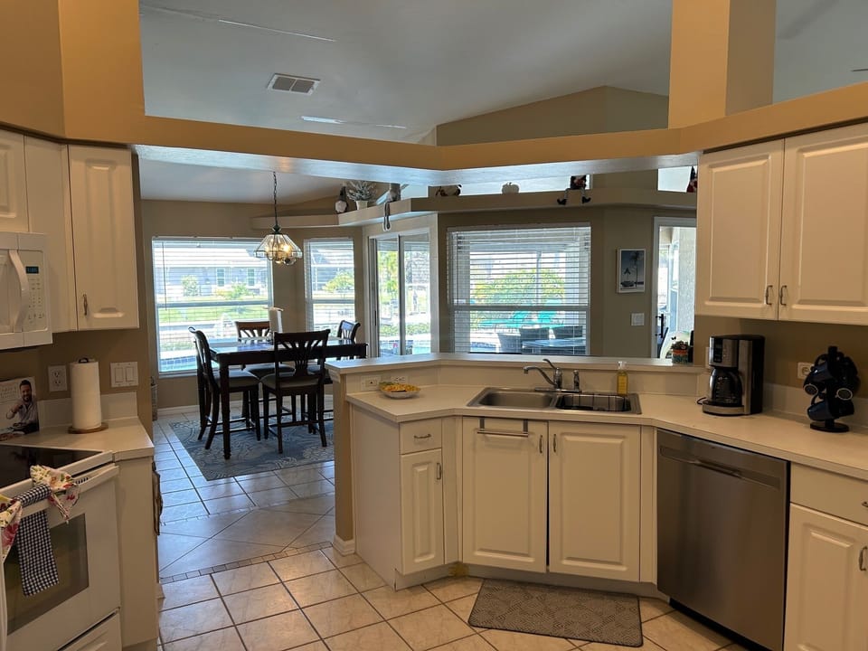 Kitchen Entrance from the Laundry Room via Garage makes easy unload of groceries