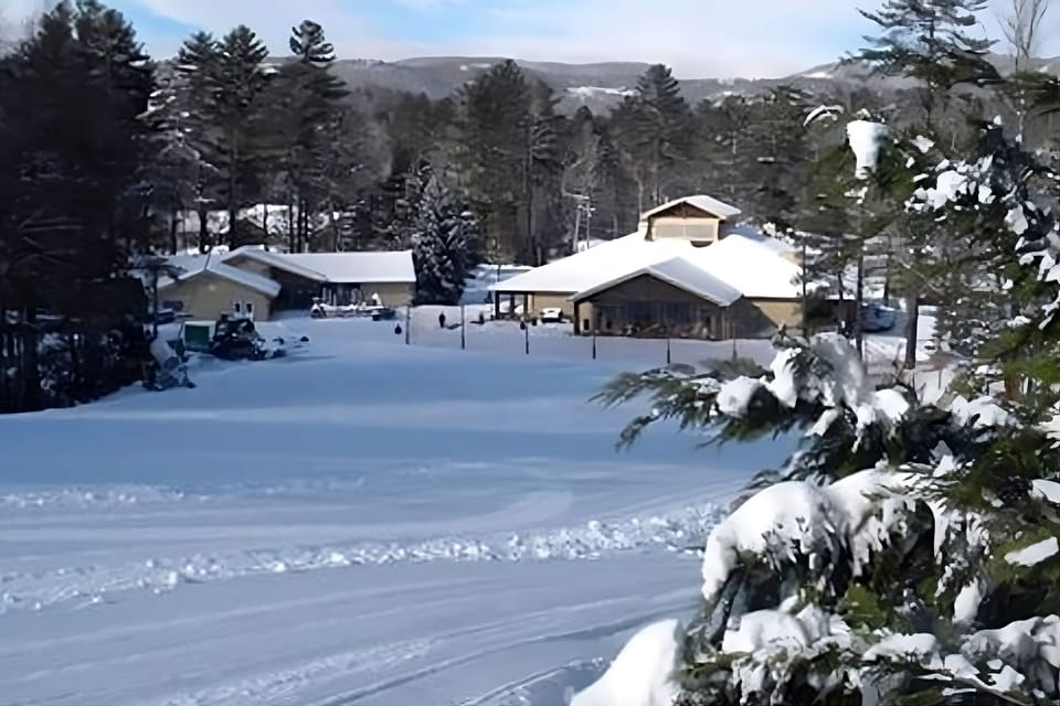 Arrive to a cozy winter retreat nestled in fresh snow.
