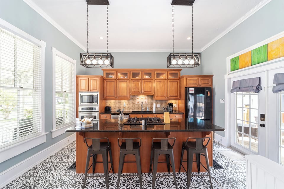 Full kitchen with two ovens, gas stove, microwave, coffee maker, refrigerator