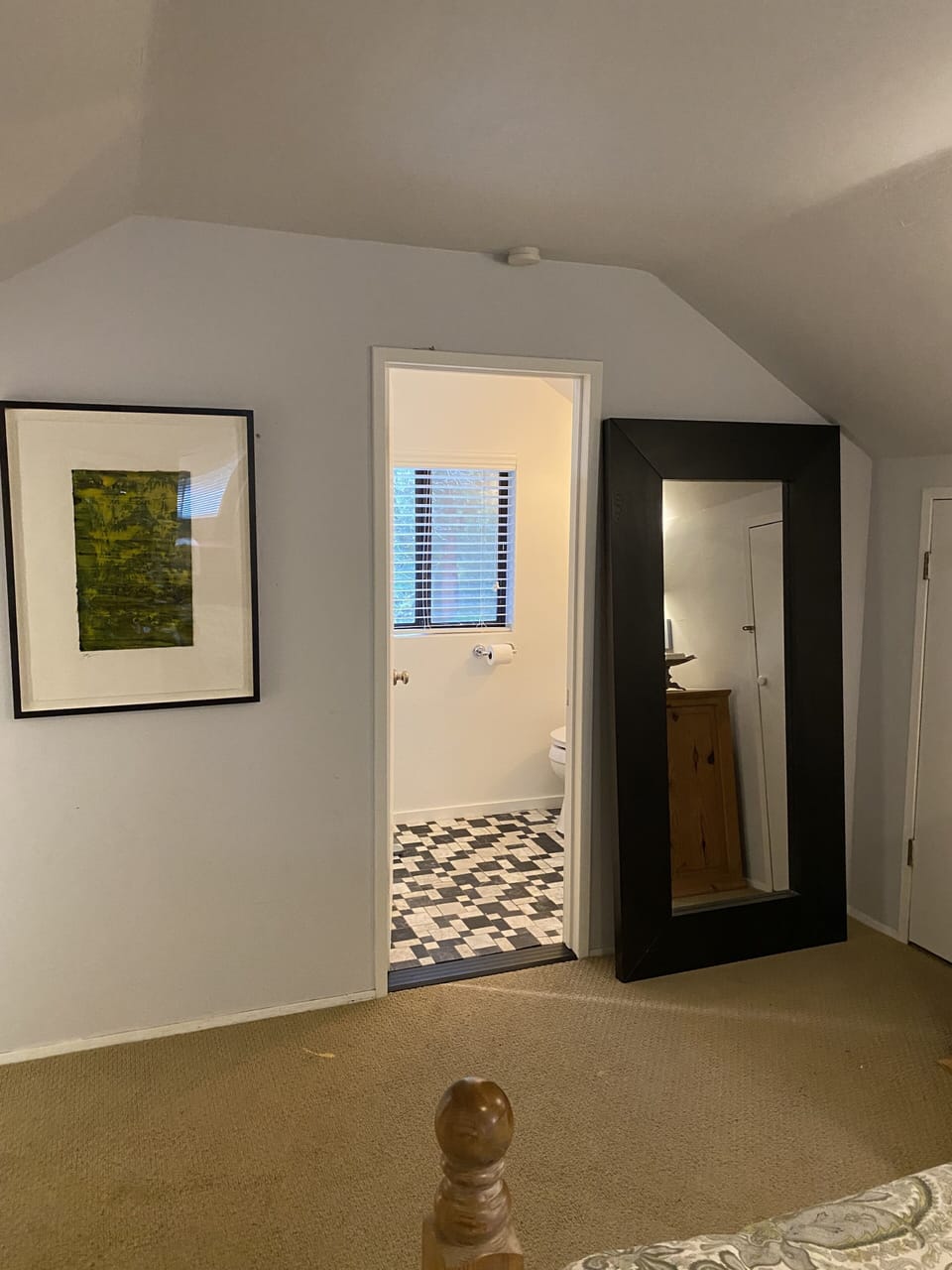 Door to upstairs bathroom.