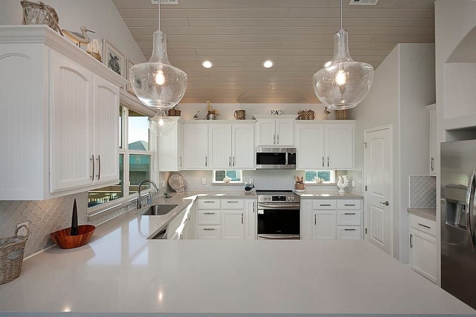 Another view of the kitchen from the 4 bar stools