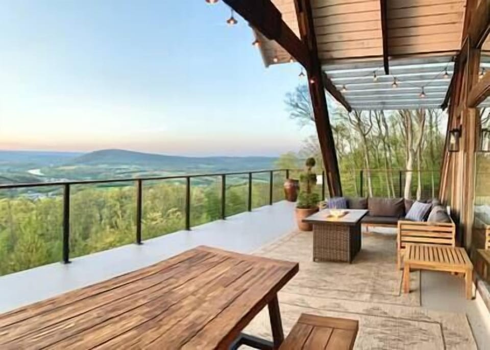 Back deck overlooking a beautiful mountain & river scenery 