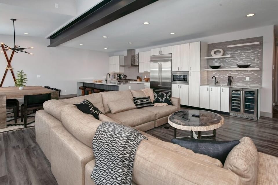 Main level living area with smart TV and gas fireplace.
