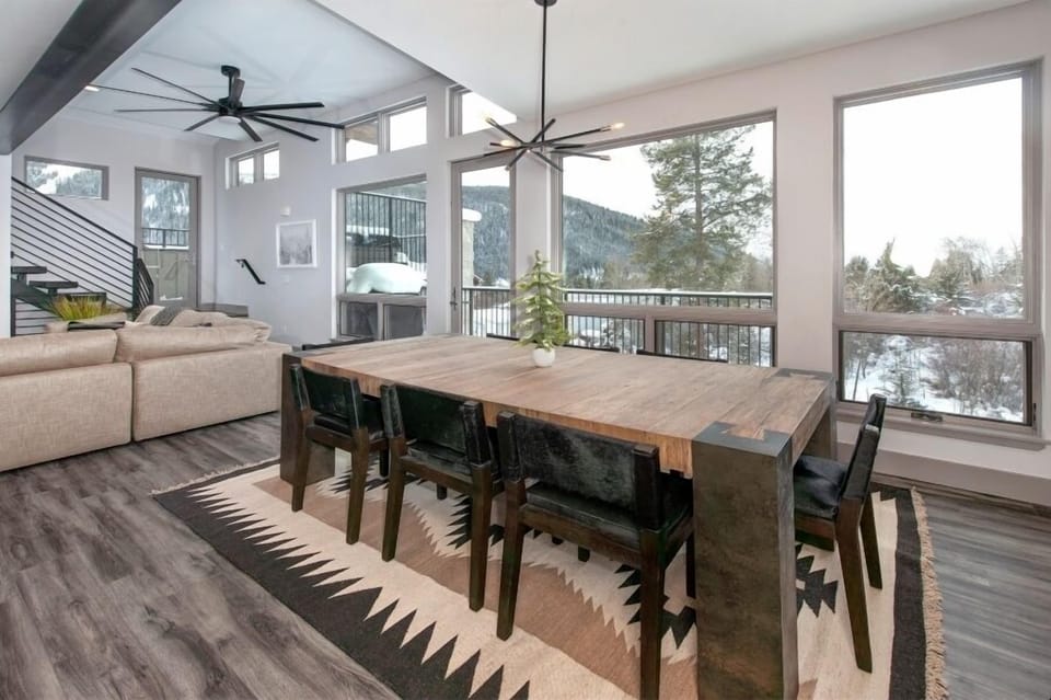 Dining area off of main level kitchen with seating for 8 people.
