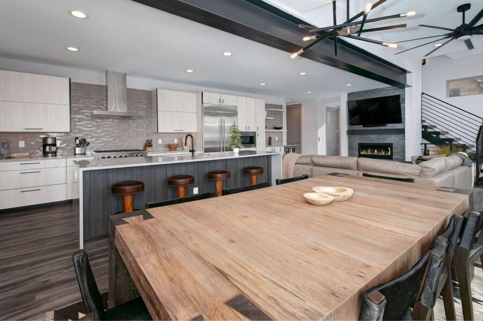 Dining area off of main level kitchen with seating for 8 people.
