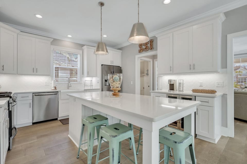Chef's kitchen with a gas range and plenty of preparation space.