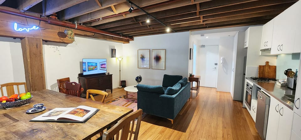 Cool New York loft style vibes. Open plan living, dining and kitchen