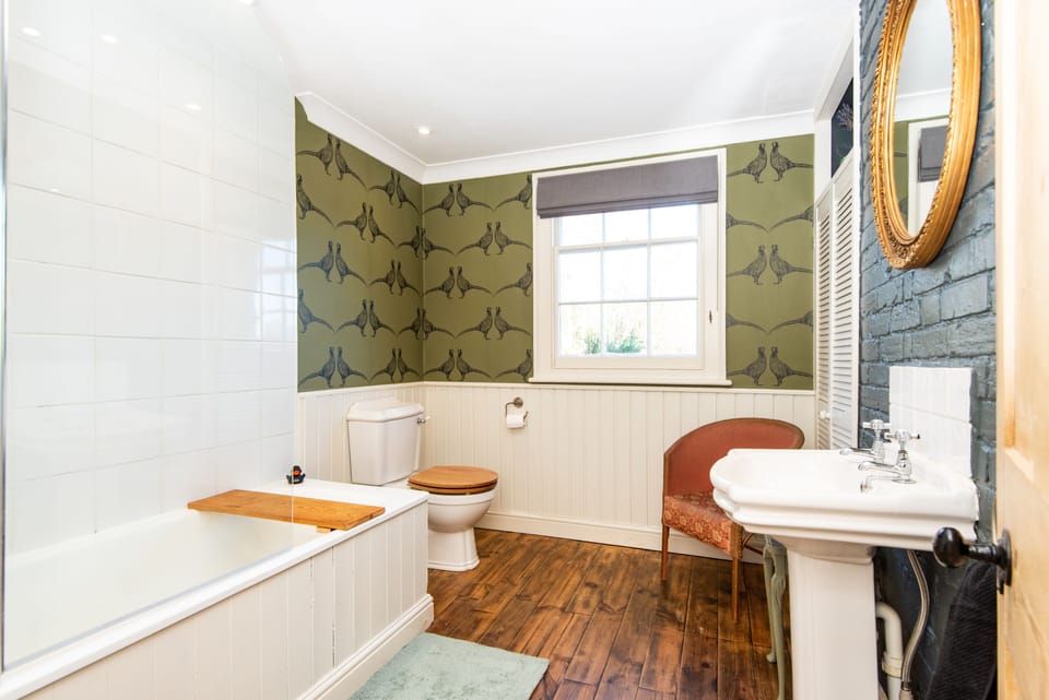 The family bathroom is spacious and beautiful.