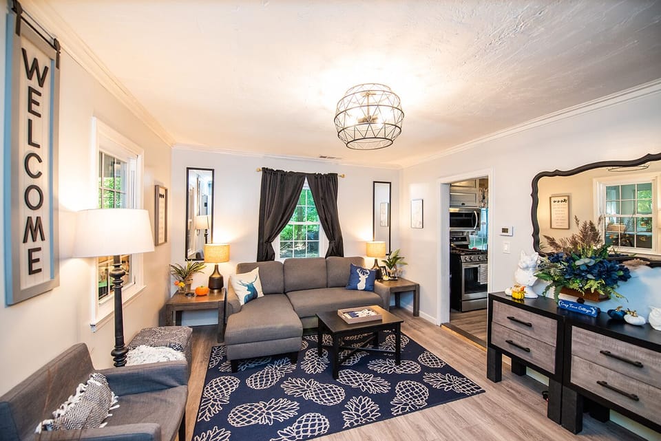 Living Room - Electric Fireplace, Couch Futon Full Bed, USB Lamps, Board Games