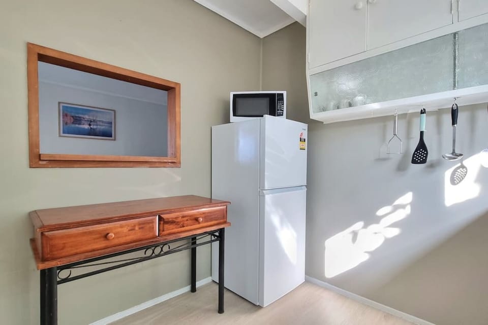 There is a fridge/freezer in the unit which is handy to store your food items.