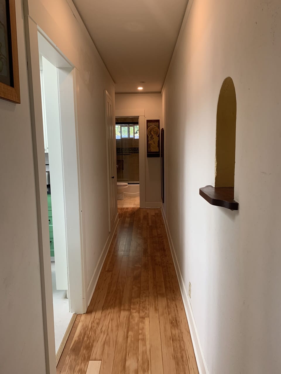 Hallway off kitchen that leads to bath/bedroom