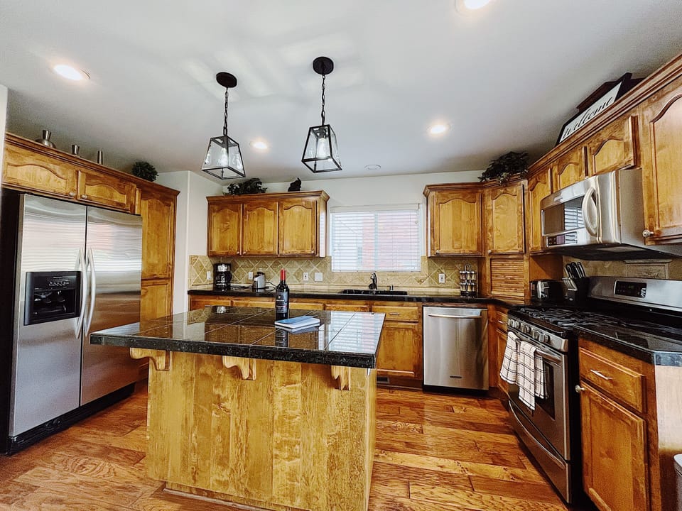 Fully stocked kitchen has all your cooking essentials and appliances. 