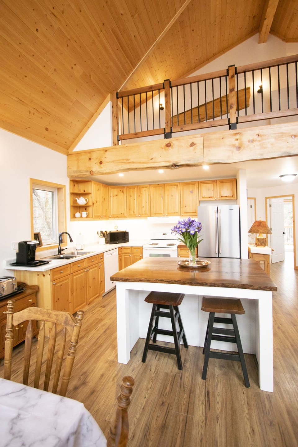 View of the kitchen island, and the open concept kitchen.  