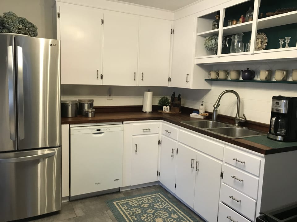 Stainless steel appliances and everything to serve up your meals. 