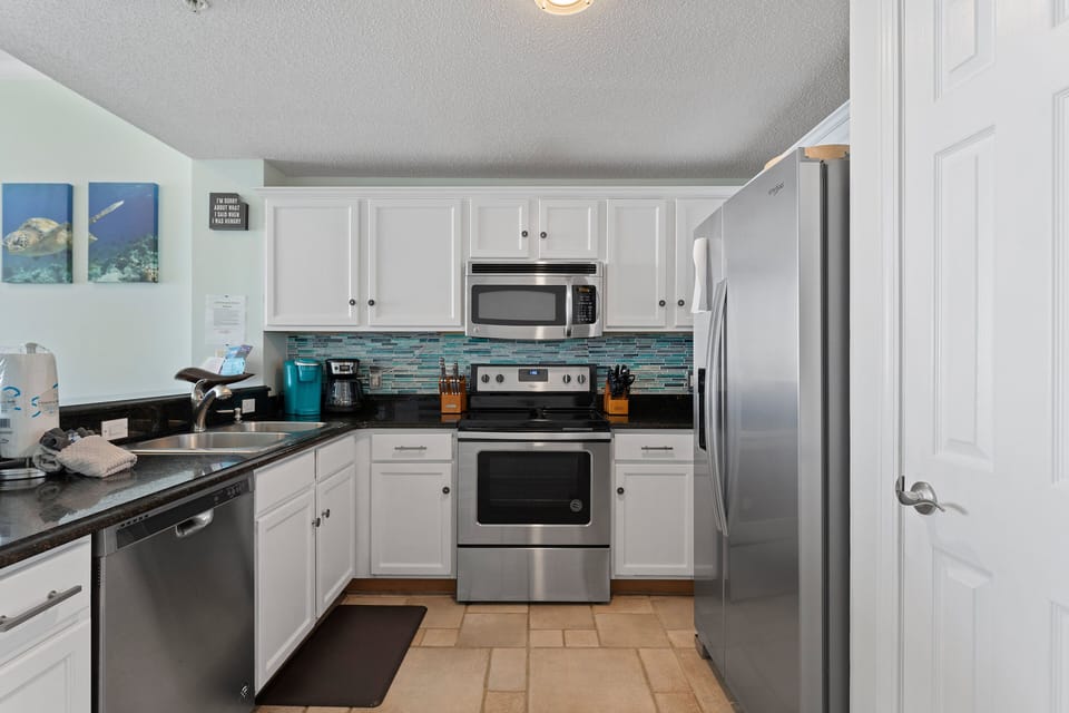 Well equipped kitchen with Keurig coffee maker.