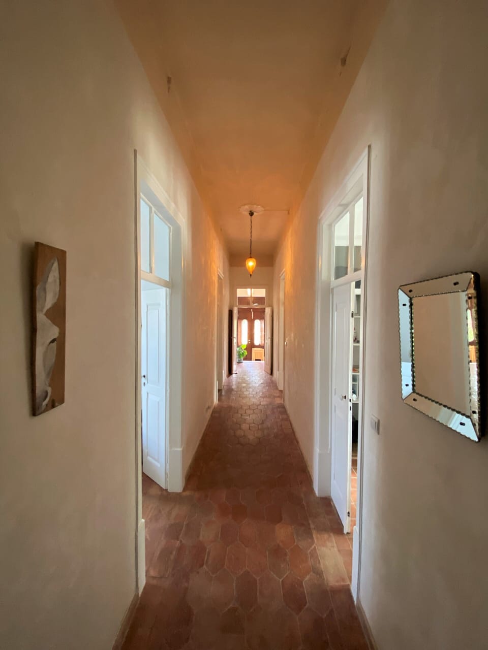 The main corridor connects the Grand Salon to the bedrooms and the Front Terrace