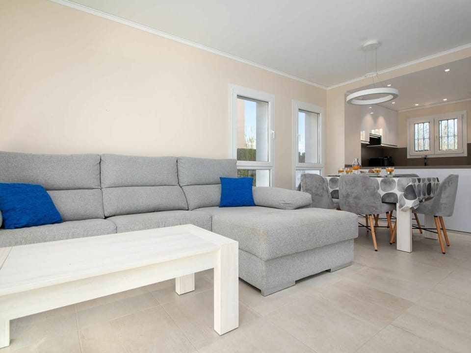 Couch, Furniture, Table, Azure, Comfort, Studio Couch, Interior Design, Building, Window, Pillow
